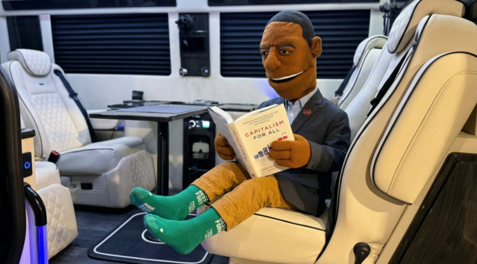 Financial Ed puppet holding Capitalism for All