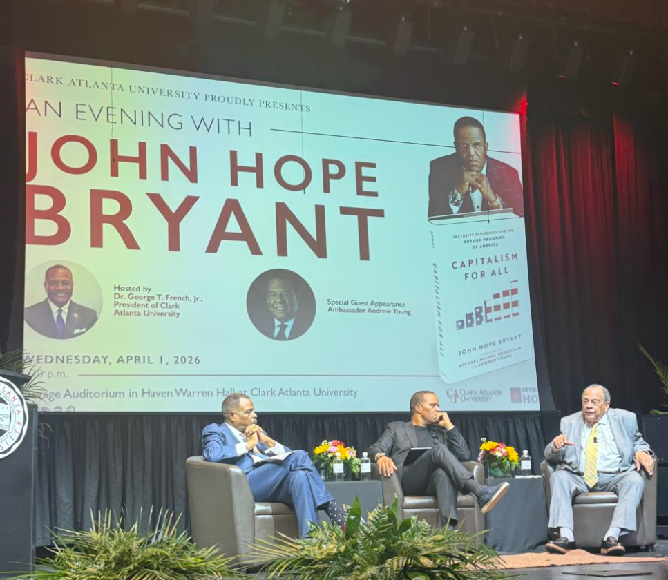 John Hope Bryant on stage at An Evening with John Hope Bryant event